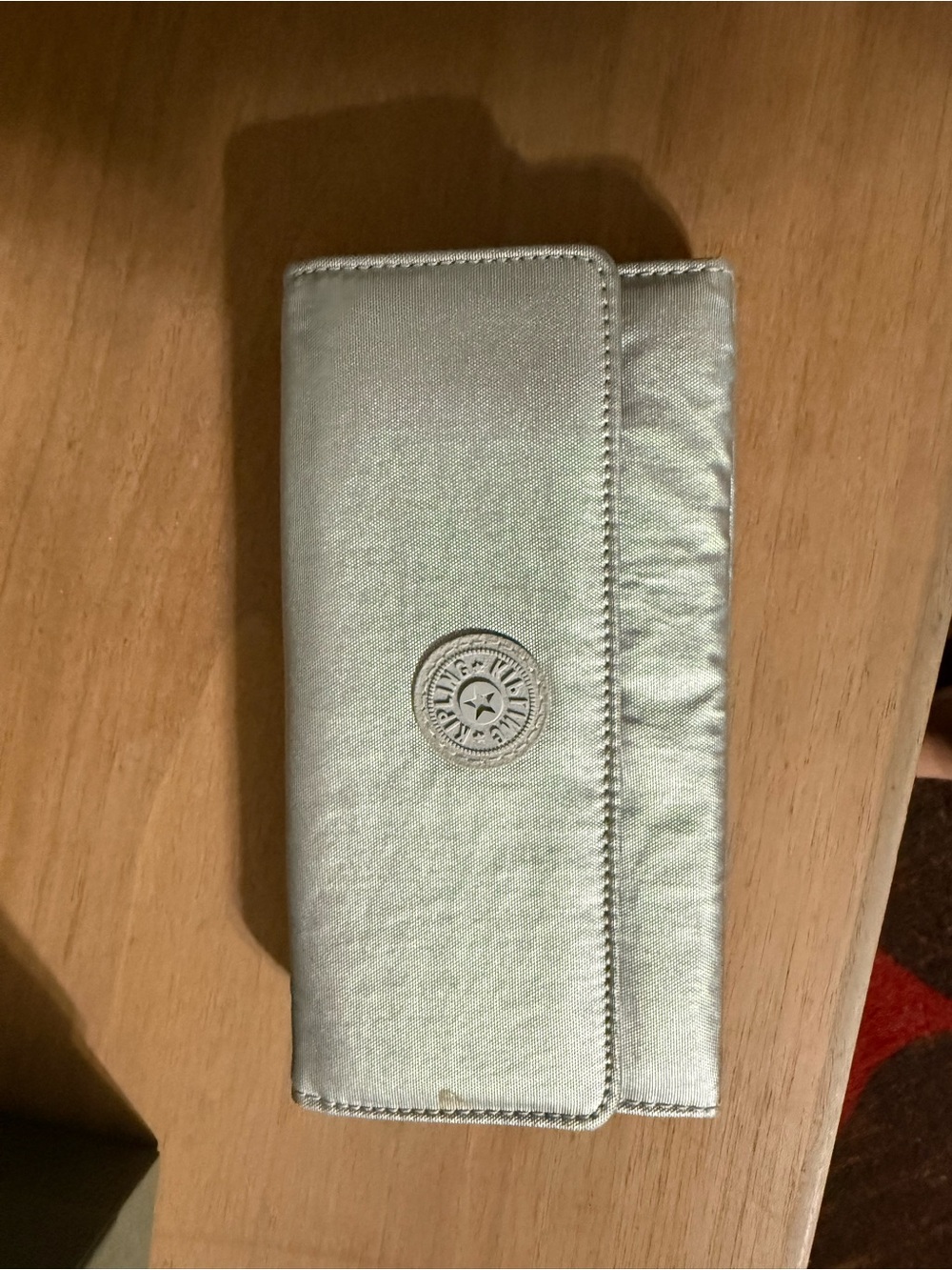 Kipling Metallic Silver Phone Wallet with Logo